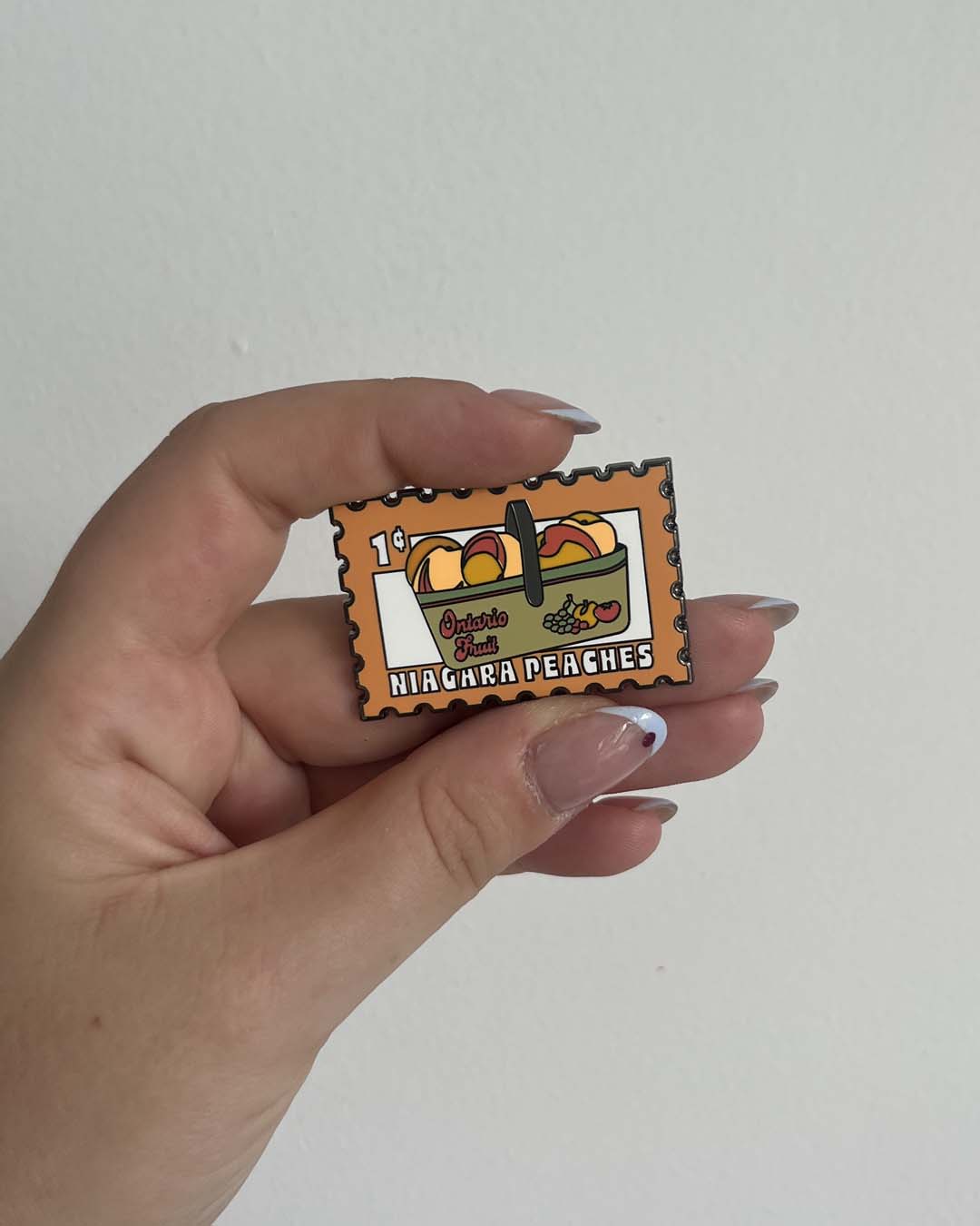 1. Niagara Peaches Enamel Pin